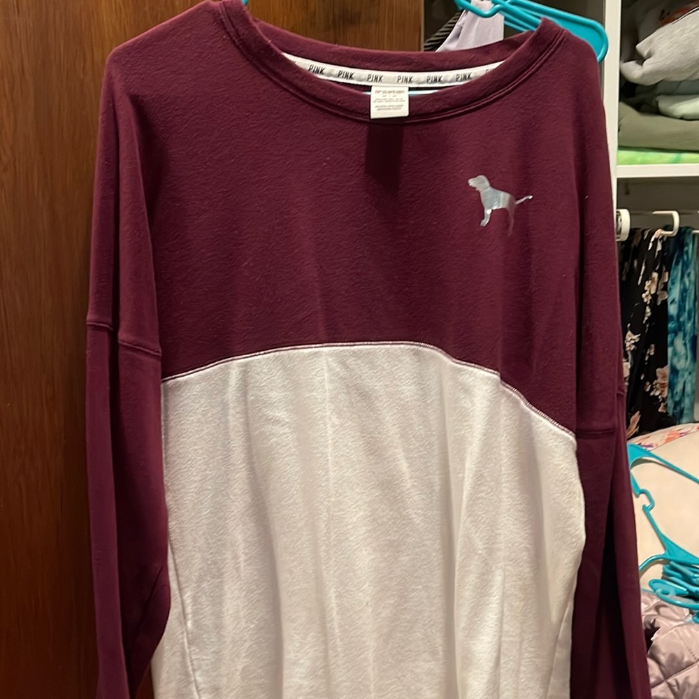 Pink long sleeved crew neck. Size medium